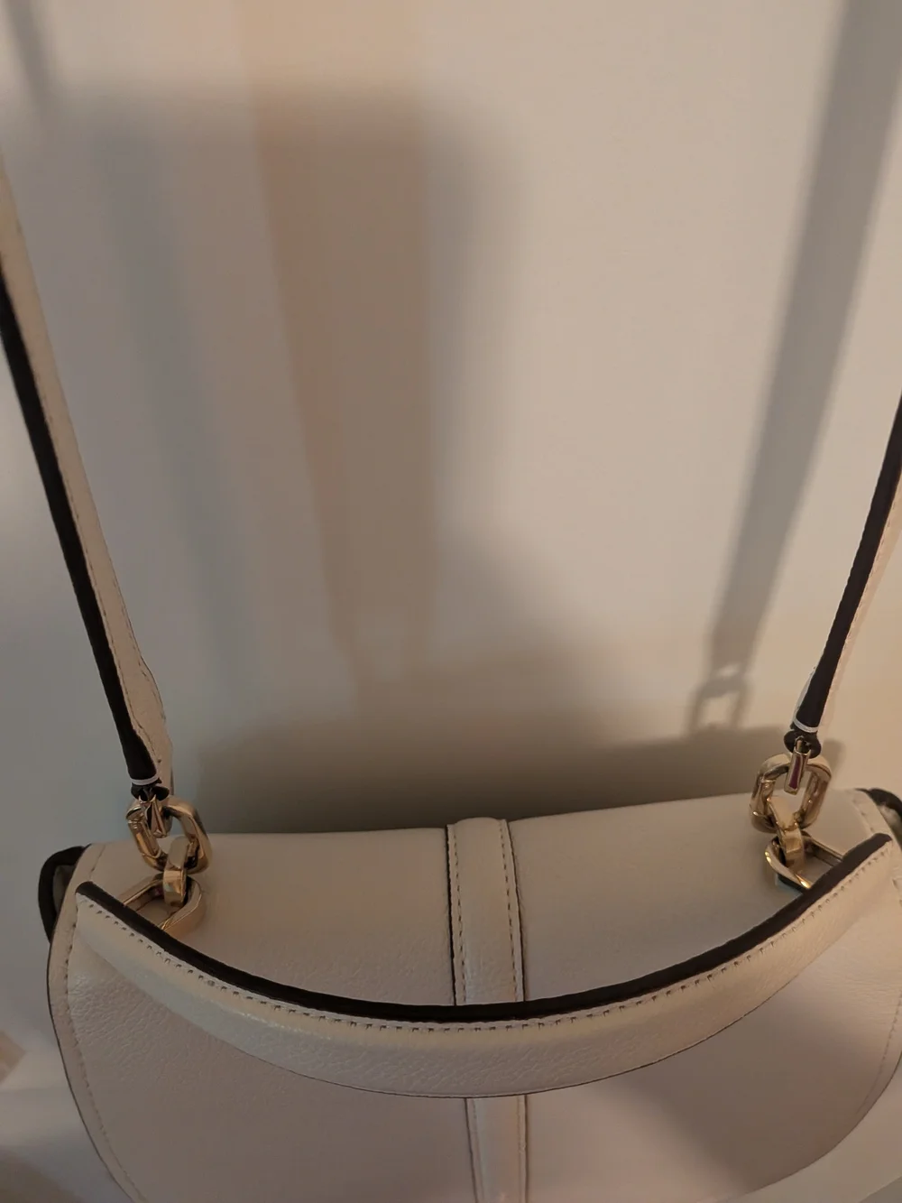 kate spade Cream Pebbled Leather Saddle Crossbody with Gold Heart Charm
